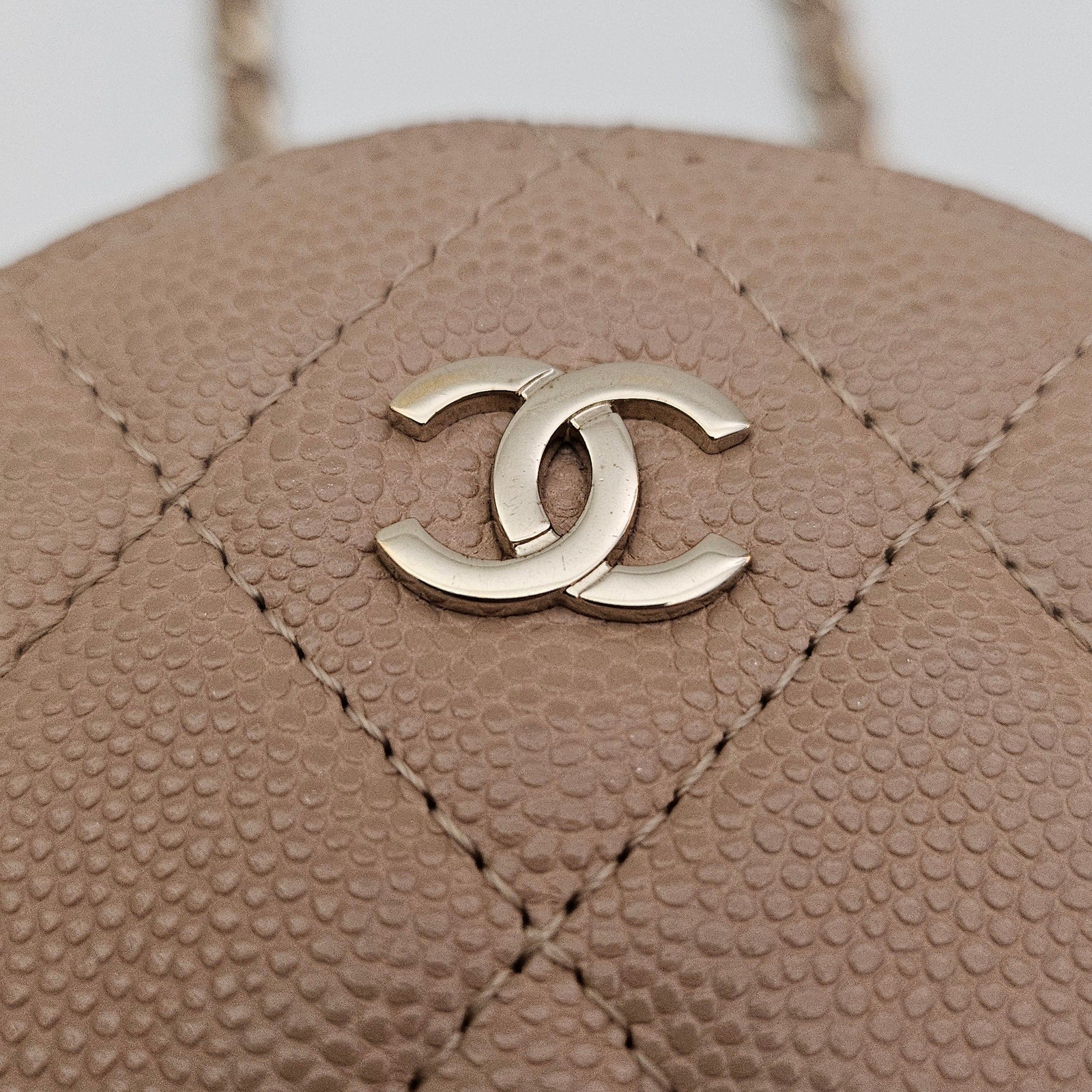 Chanel Iridescent Caviar Quilted Round Clutch With Chain Beige