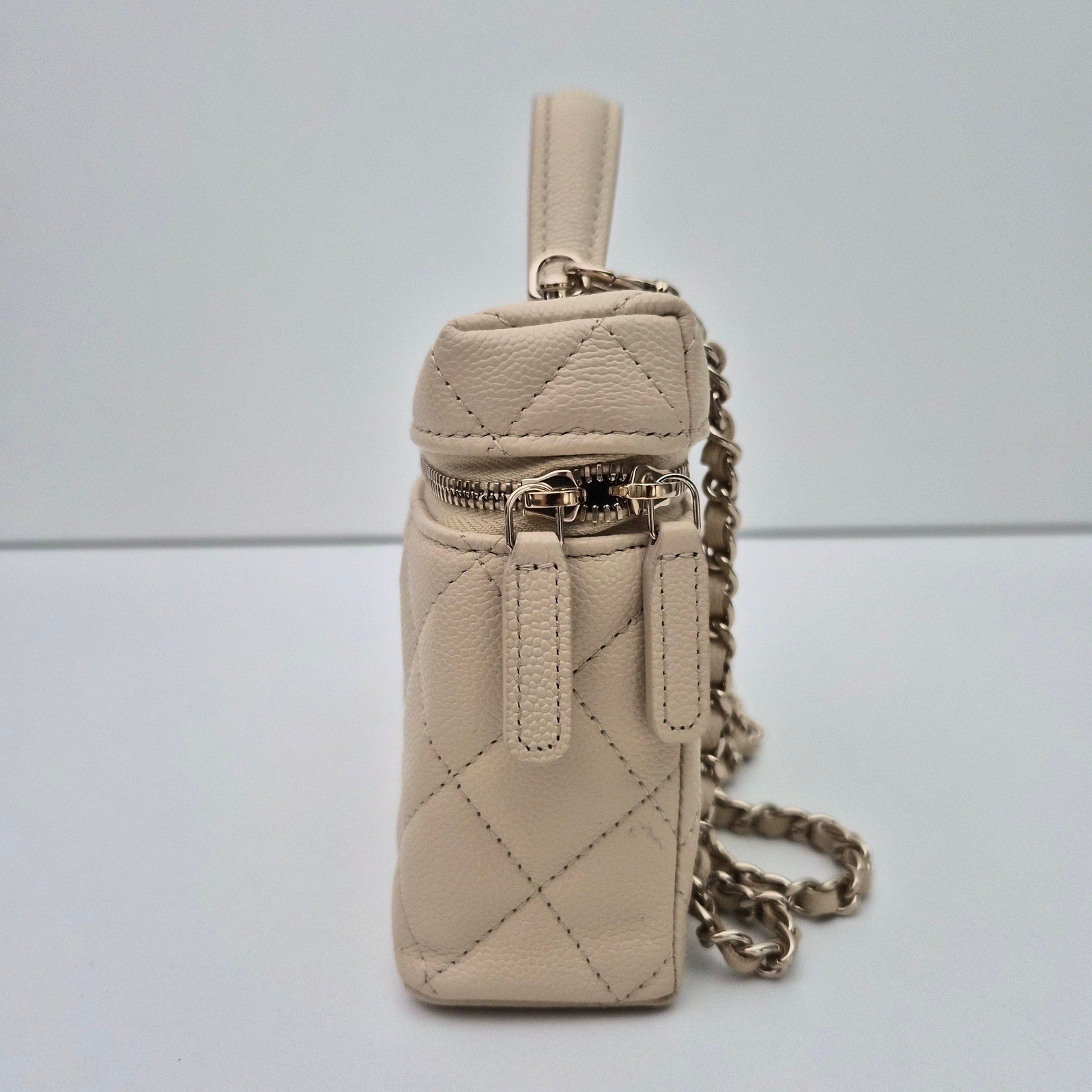 Chanel Caviar Quilted Top Handle Slim Vanity With Chain Beige