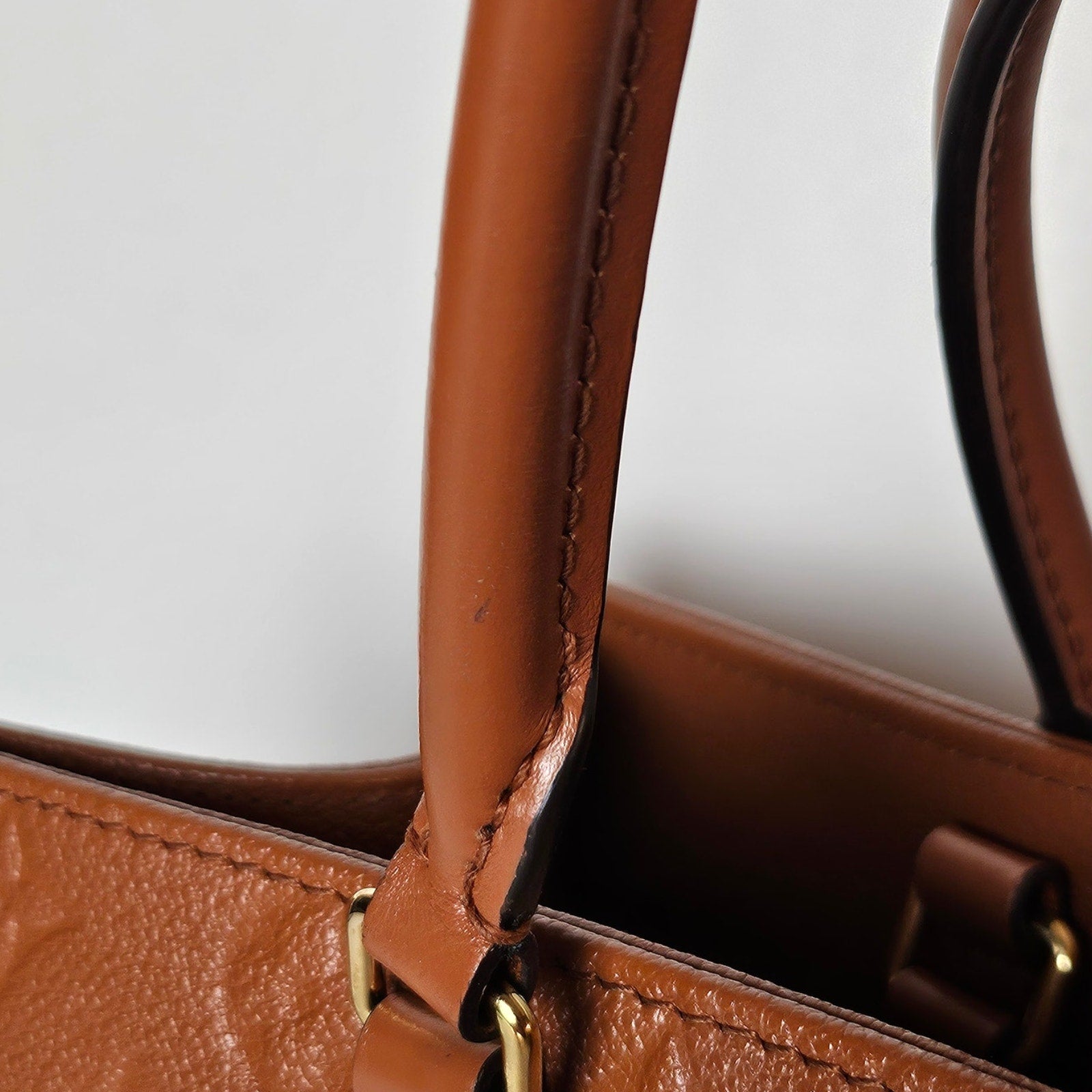 Louis Vuitton Empreinte Monogram Onthego MM Cognac Tote