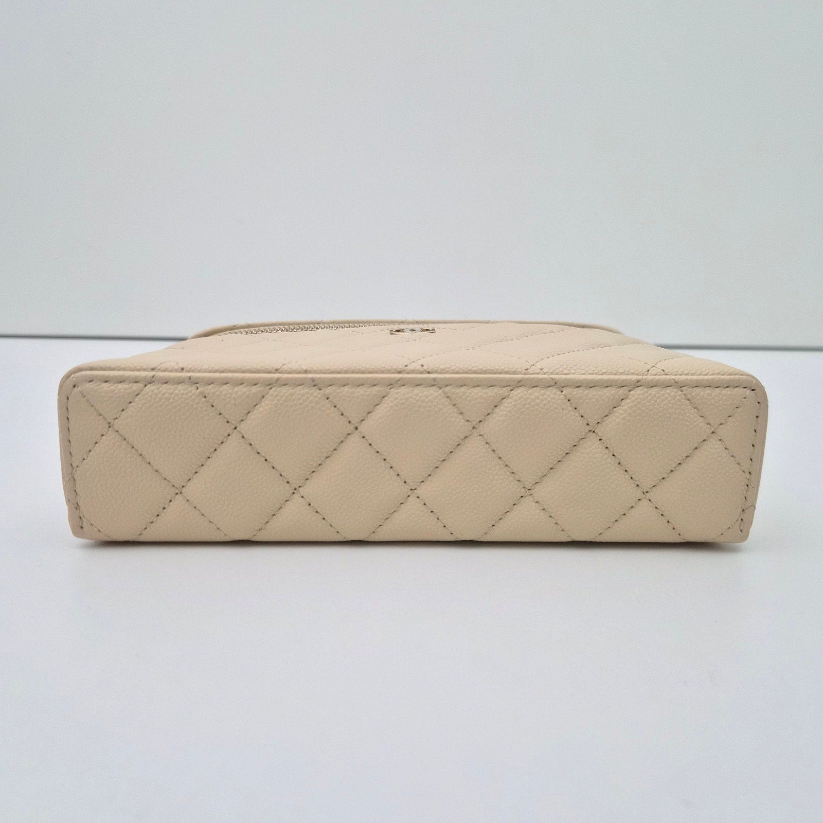 Chanel Caviar Quilted Top Handle Slim Vanity With Chain Beige