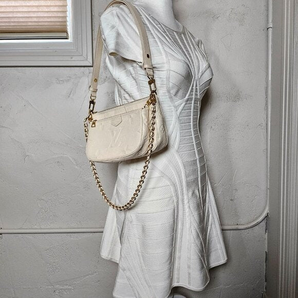 Louis Vuitton Empreinte Monogram Giant Multi Pochette Accessoires Cream